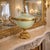 Offering an elegant heavy porcelain celadon urn with aged brass ormolu, circa late 20th century. The celadon porcelain has...