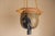 Vintage round ceramic hanging planter pot circa 1970's. Features warm matte neutral tones and a contrasting blue glaze...