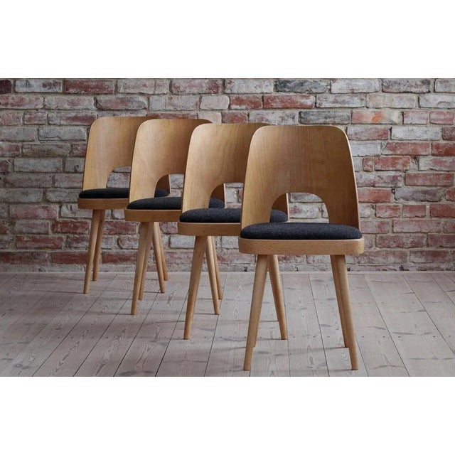 This set of six vintage dining chairs was designed by Oswald Haerdtl in the 1950s, famous Austrian designer - together...