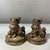 This charming pair of bronze statues depicts Qilin, mythical hooved creatures from traditional folklore, in a seated,...