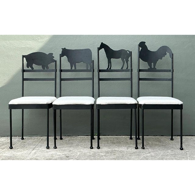 This spirited set of four dining chairs transforms a simple ladder-back silhouette into a playful celebration of pastoral...