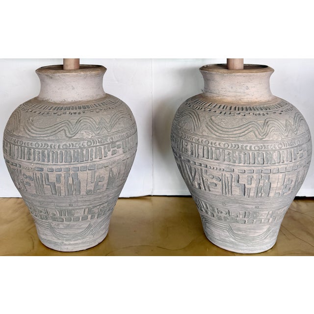 Great pair of midcentury modern table lamps in a Brutalist style. Made of terracotta with geometric design and beautiful...