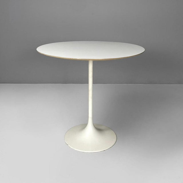 Swiss mid-century modern white laminate and metal coffee table by Vitra, 1960s Round coffee table that recalls the shape...