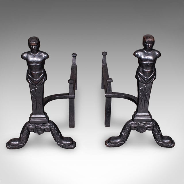 This is a pair of vintage figural andirons. An English, cast iron fire dog in the manner of the Carron Foundry, dating to...