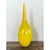 This vintage teardrop vase presents a bold, sculptural silhouette in vivid, sunny yellow glass, its bulbous lower body...