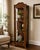 Offered is a vintage pagoda style display cabinet by Weiman. This piece is illuminated from the top with doors on each...
