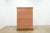 Beautiful traditional 6-drawer chest in a warm pecan finish with a rich burl-style wood grain across the drawer fronts....