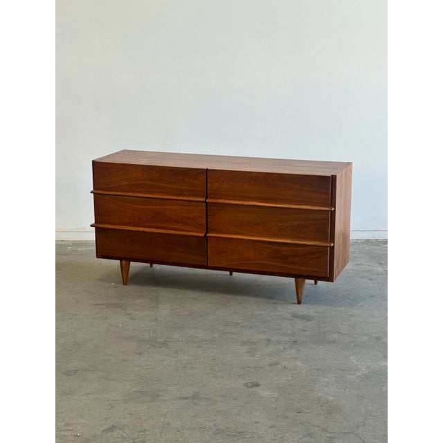 W60 D19.5 H31 VIntage walnut dresser by American of Martinsville. Unit has been freshly refiinshed and has new ball...