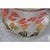 Lovely mid-century modern ice bucket featuring leaves in autumn colors. Made of glass. The leaves are in red, green and...