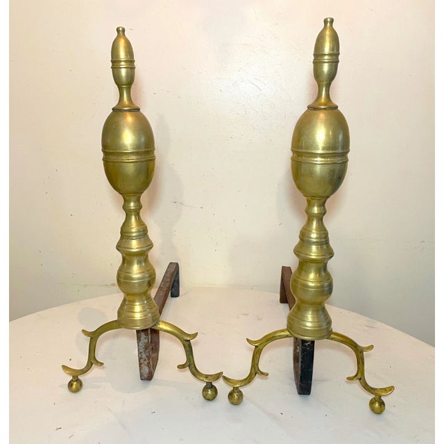 Up for sale is a rare pair of large 18th century brass and cast iron Federal double lemon fireplace andirons. They're made...