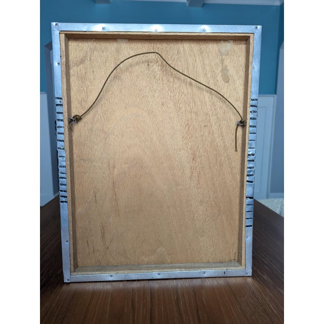 A striking, highly textured vintage mid-century modern Brutalist mixed-metal wall relief sculpture dated 1974. This...