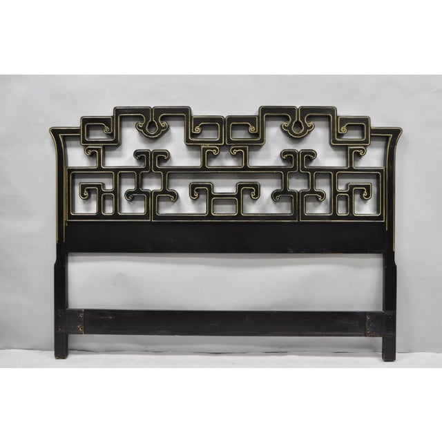 Vintage Chinoiserie Black & Gold Ebonized Chinese Fretwork Queen Size Bed Headboard. Circa Mid 20th Century. Measurements:...