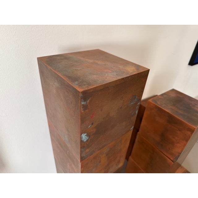 Paul Kelley’s Magnetic Copper Cubes blur the boundaries between sculpture, furniture, and interactive design. Conceived as...