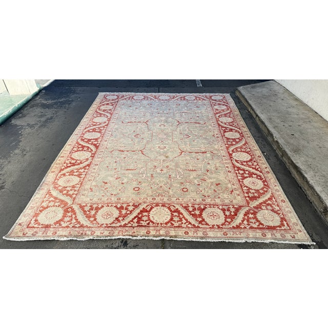Design Plus Gallery presents a Vintage Pakistani Hand-Knotted Wool and Silk Area Rug. The composition displays an ornate...