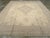 An antique Turkish Oushak room size carpet. This soft-colored western Turkish workshop Oushak is in the Heriz style with a...