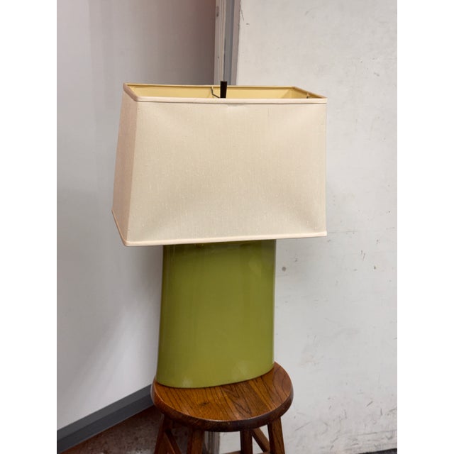 Design Plus Gallery presents a Boka Table Lamp from Crate & Barrel. This table lamp has a green ceramic base with a...