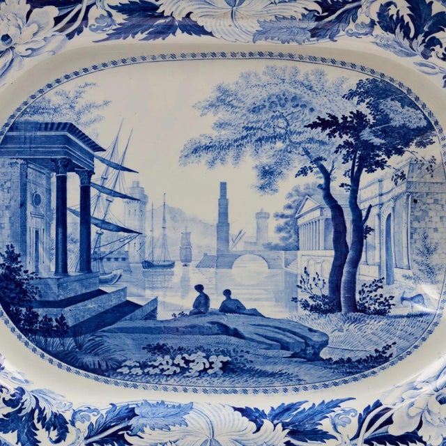 Large antique 19th century Wedgwood blue and white transfer meat platter. Deep foot with a well to collect juice. Scene...