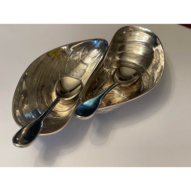 Vintage Silver Mussel Salt and Pepper Holder with Spoons. Delicate and solid all at once. A sweet coastal detail for your...