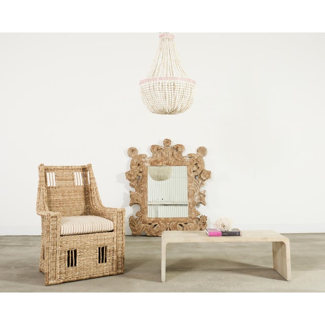 A sculptural 20th century waterfall coffee cocktail table finished fully clad in light ivory natural shagreen. The surface...