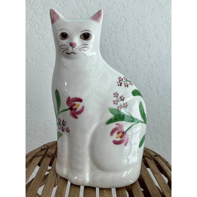 Excellent Pre-Owned Condition. Note: Rattan & bamboo riser is not included. With a quizzical stare and fabulous good...