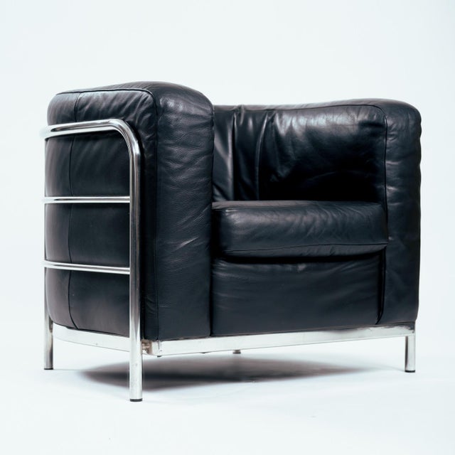 De Pas, D’Urbino and Lomazzi for Zanotta, curved lounge chair, model 'Onda', matte black leather, high polish chrome,...