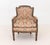 Louis XVI Style Upholstered Children's Bergere, with distressed painted wood frame. 29.25" H x 24.25" W x 23" D; seat:...
