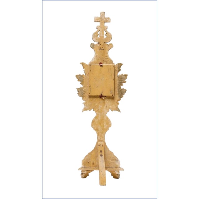 A rare and remarkable 18th-century Italian giltwood reliquary containing its original sealed relic. The baluster-form...