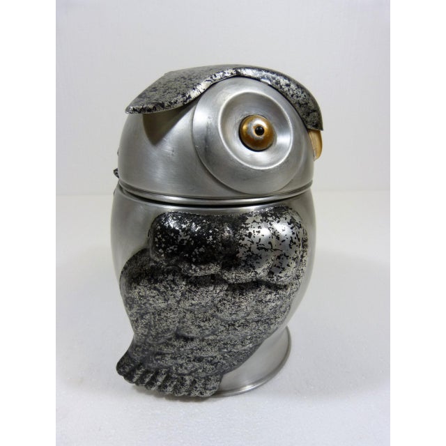 Ice bucket in the shape of an owl, Italy. Aluminium in silver, black and brass colour, inside a plastic ice holder....