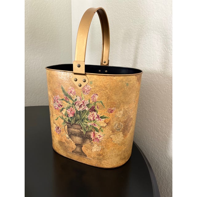 Bring a romantic accent to your home with this decorative gold metal basket. Pink roses arranged in a classical urn adorn...