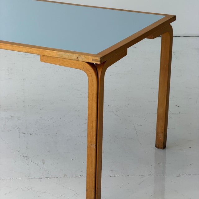 c. 1980s. Denmark. Bent birch legs and inset painted top. This piece is attributed to the mentioned designer/maker. It has...