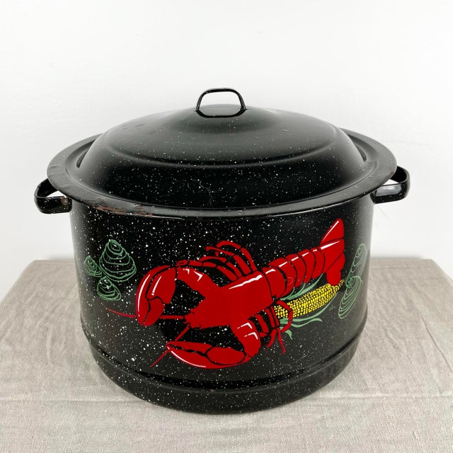 Vintage enamel lobster pot. Black speckled metal pot with lid, with red lobster and clam design. Large size perfect for...