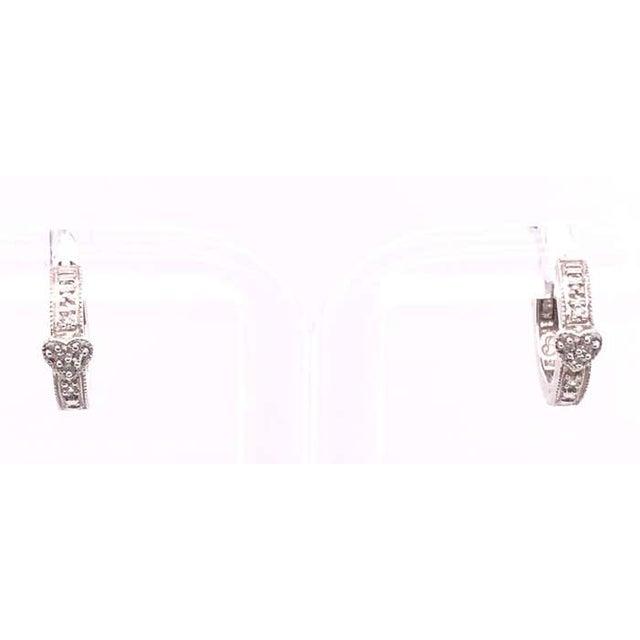 14 Karat White Gold Diamond Heart Front And Back Hoop Earrings 3 grams total weight.