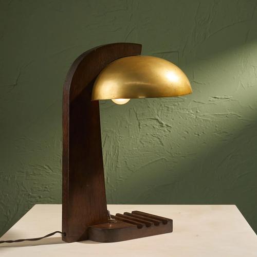 This table lamp was made in France around 1930 and combines elements of Modernist and Arts and Crafts design. It features...