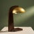 This table lamp was made in France around 1930 and combines elements of Modernist and Arts and Crafts design. It features...