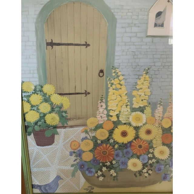 A beautiful, large mid-century framed offset lithograph titled "In a Courtyard" (1973) by famed British floral still-life...