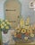A beautiful, large mid-century framed offset lithograph titled "In a Courtyard" (1973) by famed British floral still-life...