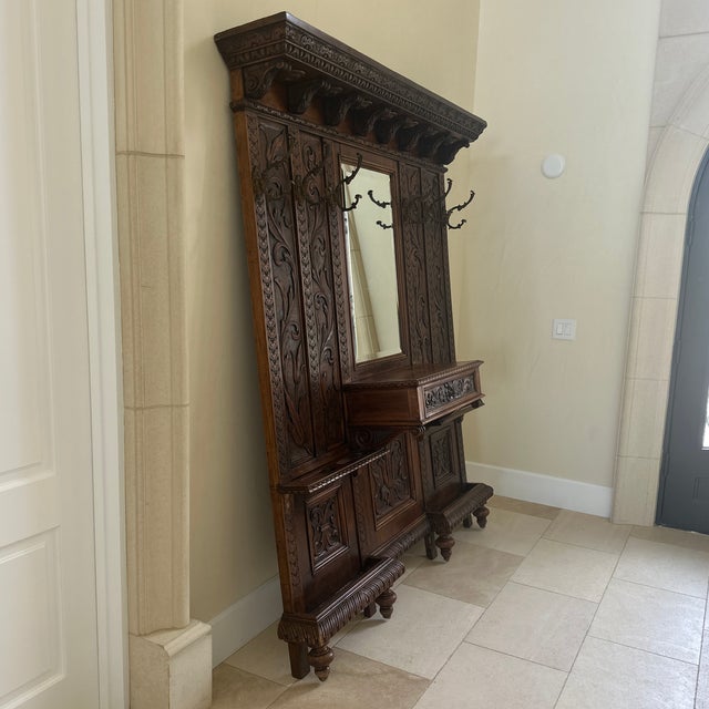 Beautiful Antique Italian Hall Tree that goes beautifully in any grand entrance. Can hold coats, hats, umbrellas. Whatever...