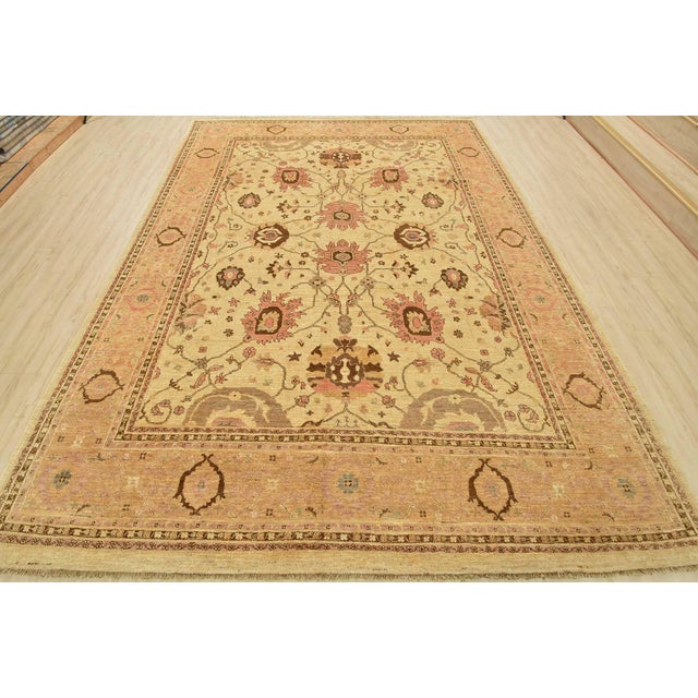 This traditional Ziegler rug is hand-knotted with an all-wool pile on a cotton foundation. This rug is new and in...