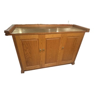 Pulaski Oak Bar With Brass Top and Foot Rail, Griffin Carvings, Plus Custom Inset Oak Doors, Attributed For Sale