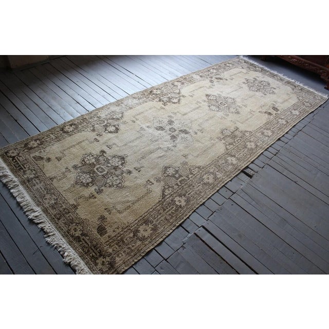 This beautiful, vintage, hand knotted rug is approximately 100 years old. It is handmade, of very fine quality hand spun...