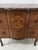 A lovely transition-style marquetry commode with a projecting front panel. vene over an oak ground. two drawers without a...