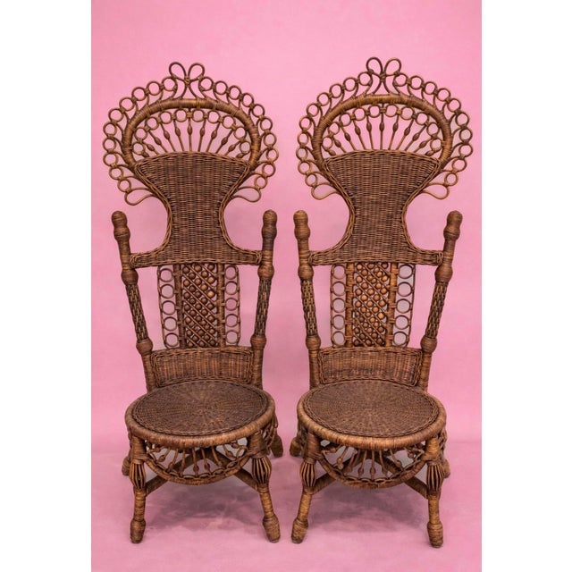 Amazing chairs from prestigious American Heywood - Wakefield circa 1910s - 1930s Very intricate design with various swags,...