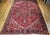 "This vintage Persian Heriz rug from the early 1900s. Woven in Northwest Persia, this rug features a classic geometric...