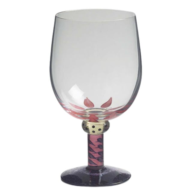 Highly collectible and no longer in production, the Palm Trees stemware collection by Kosta Boda was designed by Ken Done,...