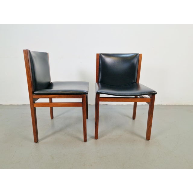 Set of 2 rosewood chairs, Tito Agnoli, 1960 Designer: Agnoli, Tito Color: black, brown Material: wood Style: Scandinavian...