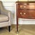 This early 20th century Federal bow front server features richly figured flame mahogany veneers, refined fluted details,...