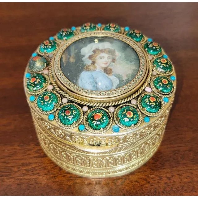 PRESENTING A STUNNING Early 19C French Gold Box with Enamel and Miniature Portrait. Box made with brass but has been...