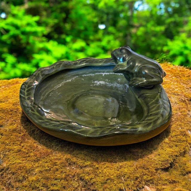 This is the perfect addition to your patio, porch or garden. It's a forest green ceramic fountain Just needs a water pump...