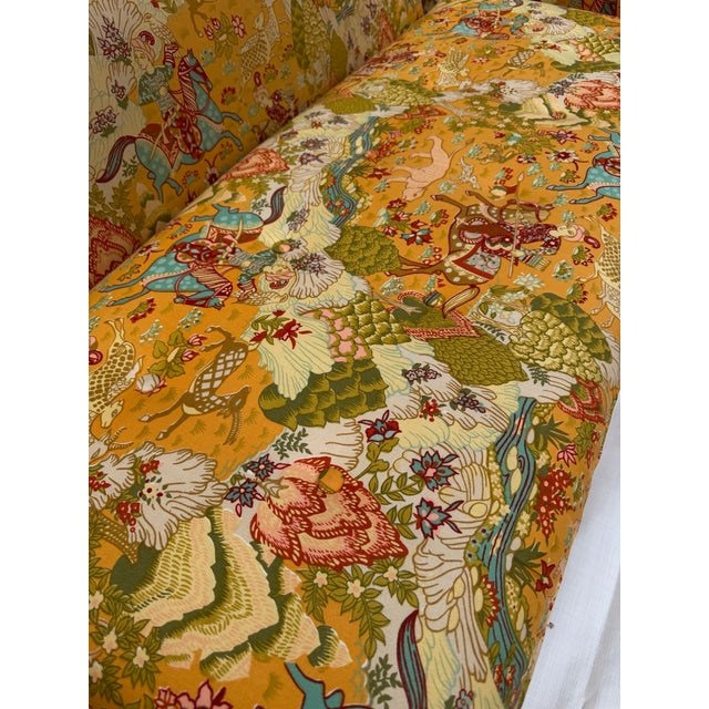 This listing is for a matching pair of Asian-motif upholstered, vintage 1950s rolled arm love seats by Beachley furniture...
