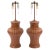 A pair of vintage chocolate brown ceramic table lamps, possibly from Christopher Spitzmiller. Ribbed and shaped chocolate...
